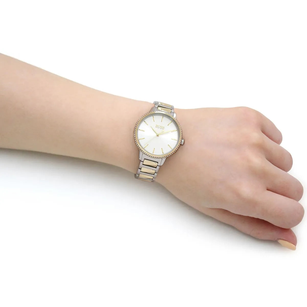 Hugo Boss Signature watch worn on wrist showing silver dial and two-tone bracelet