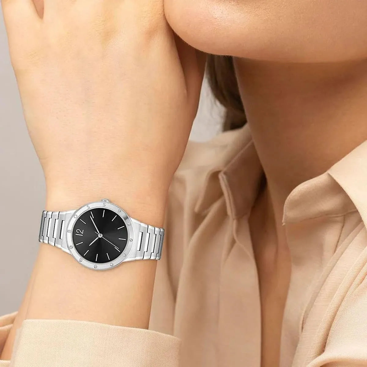 Hugo Boss Breath women's watch on wrist showing sleek design with silver strap