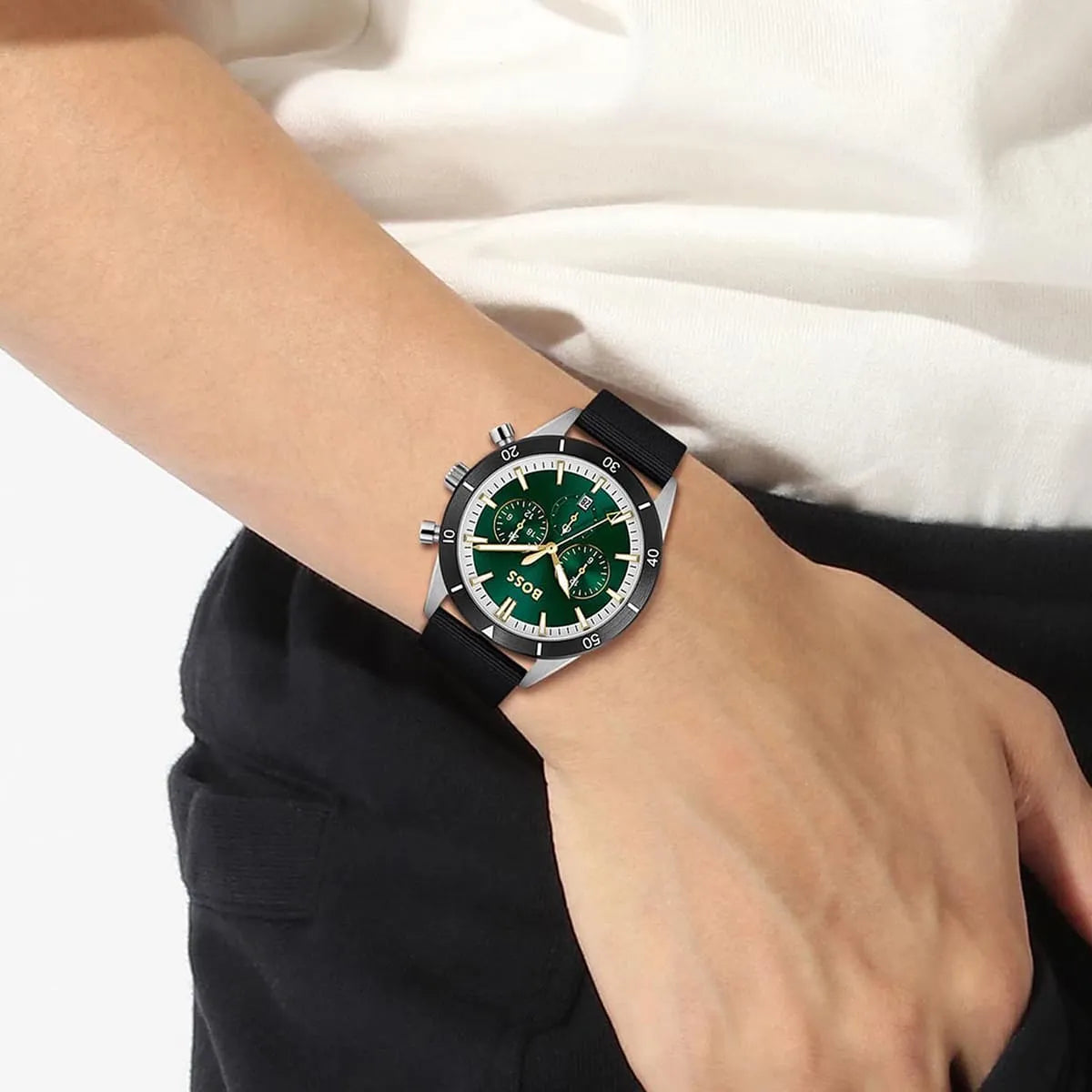 Hugo Boss Santiago chronograph watch on wrist with green dial and steel case in side profile
