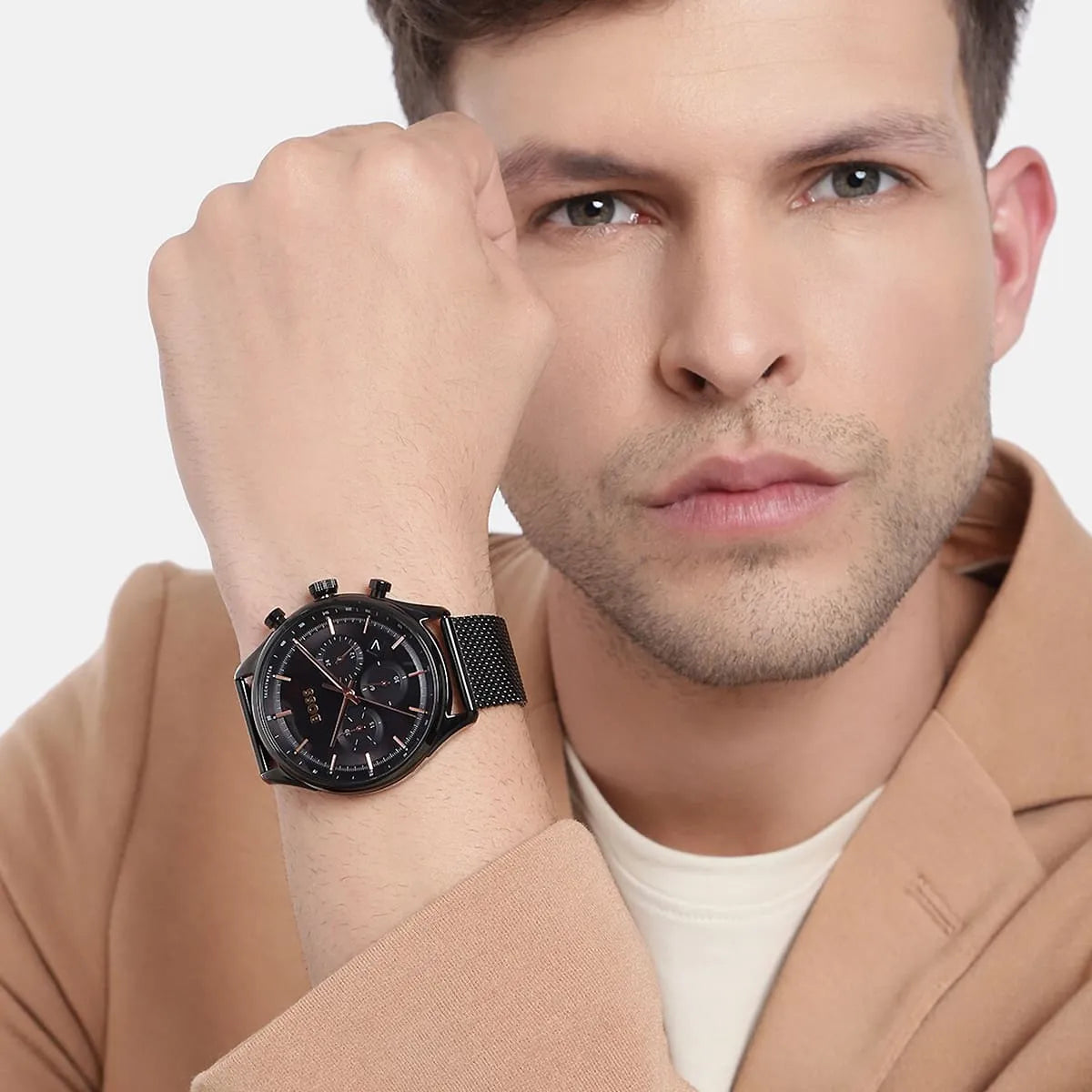 Hugo Boss Gregor chronograph watch on wrist with casual styling and tan jacket