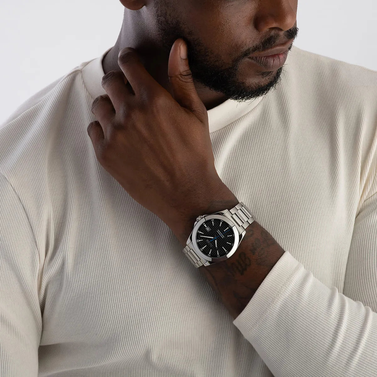 Hugo Boss Skymaster watch worn on wrist with black dial and metal bracelet