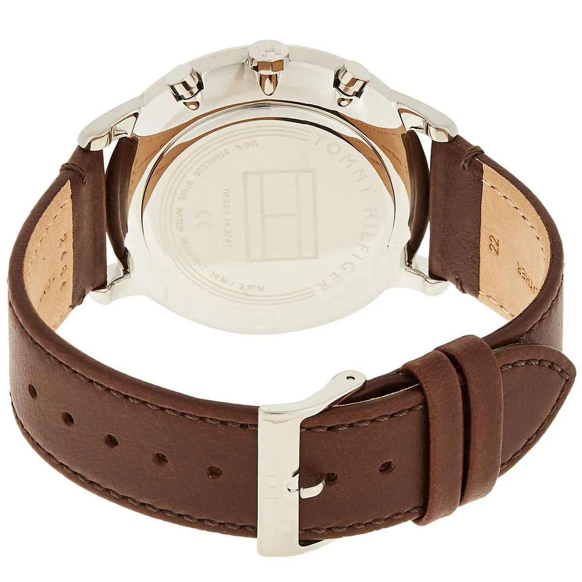 Tommy Hilfiger watch caseback view showing stainless steel back and brown leather strap