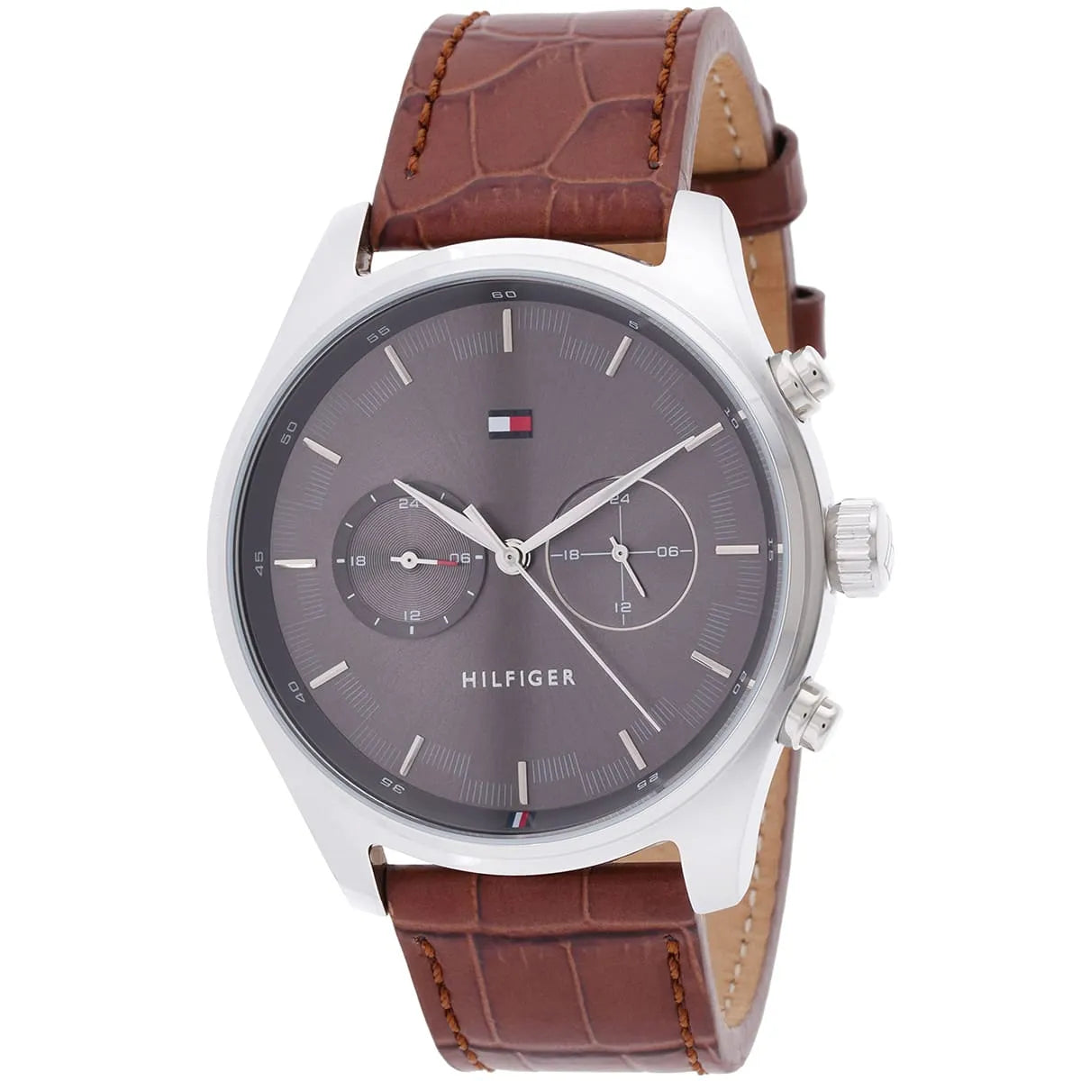 Tommy Hilfiger Sawyer watch at angle showing silver case, gray dial, and brown leather strap