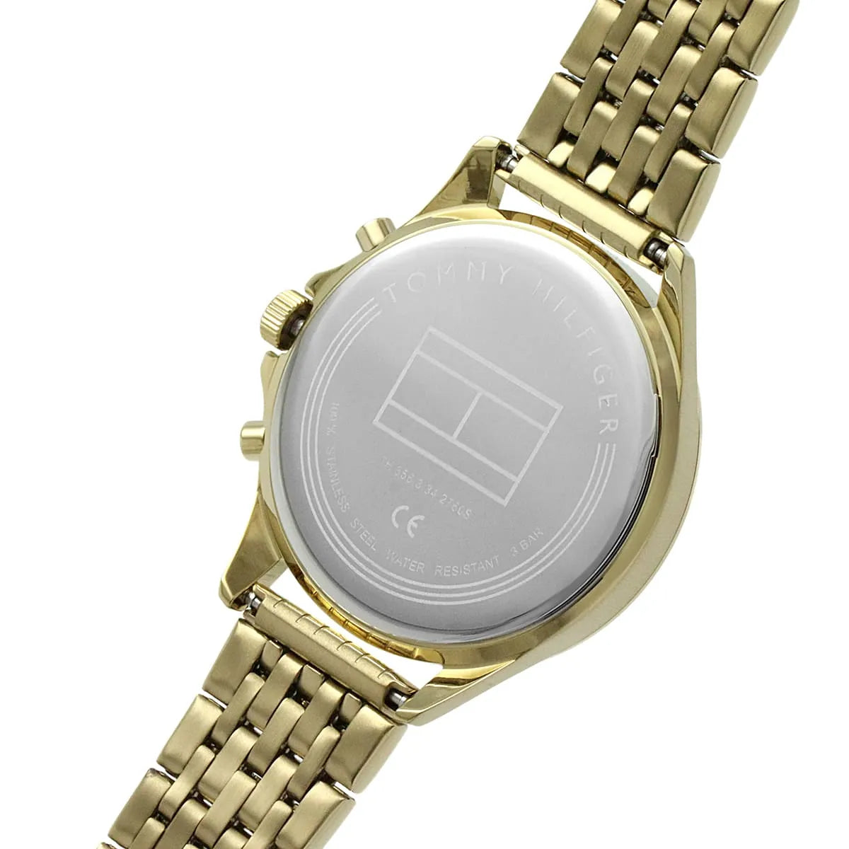 Close-up of Tommy Hilfiger Ari watch caseback showing transparent crystal with Tommy Hilfiger logo