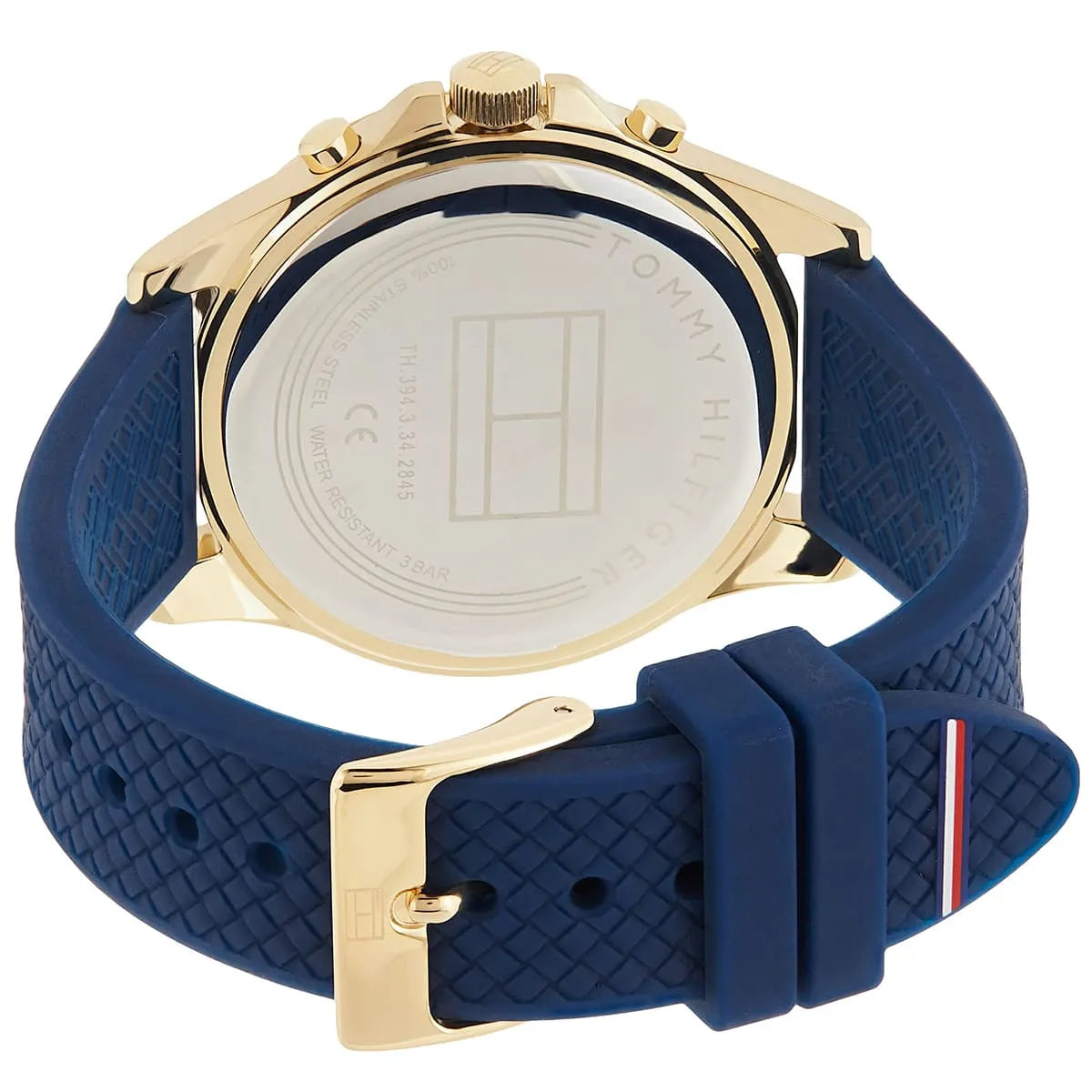 Tommy Hilfiger Haven watch caseback showing transparent crystal with branding and blue strap