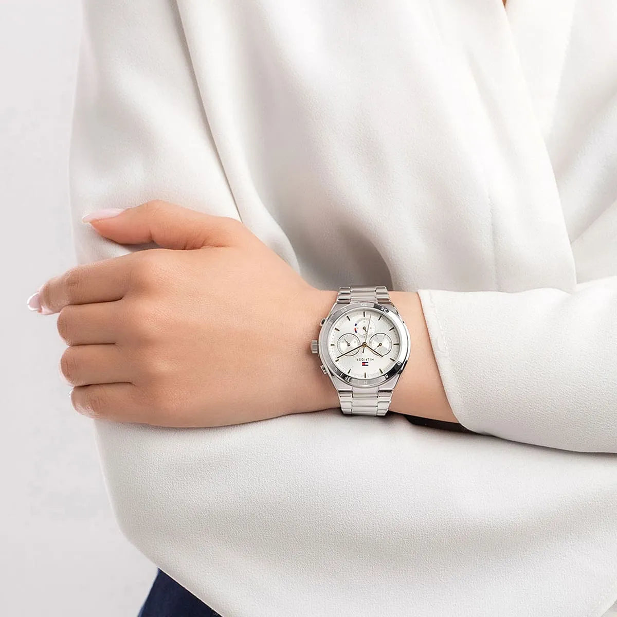Tommy Hilfiger Libby women's watch worn on wrist over white sleeve