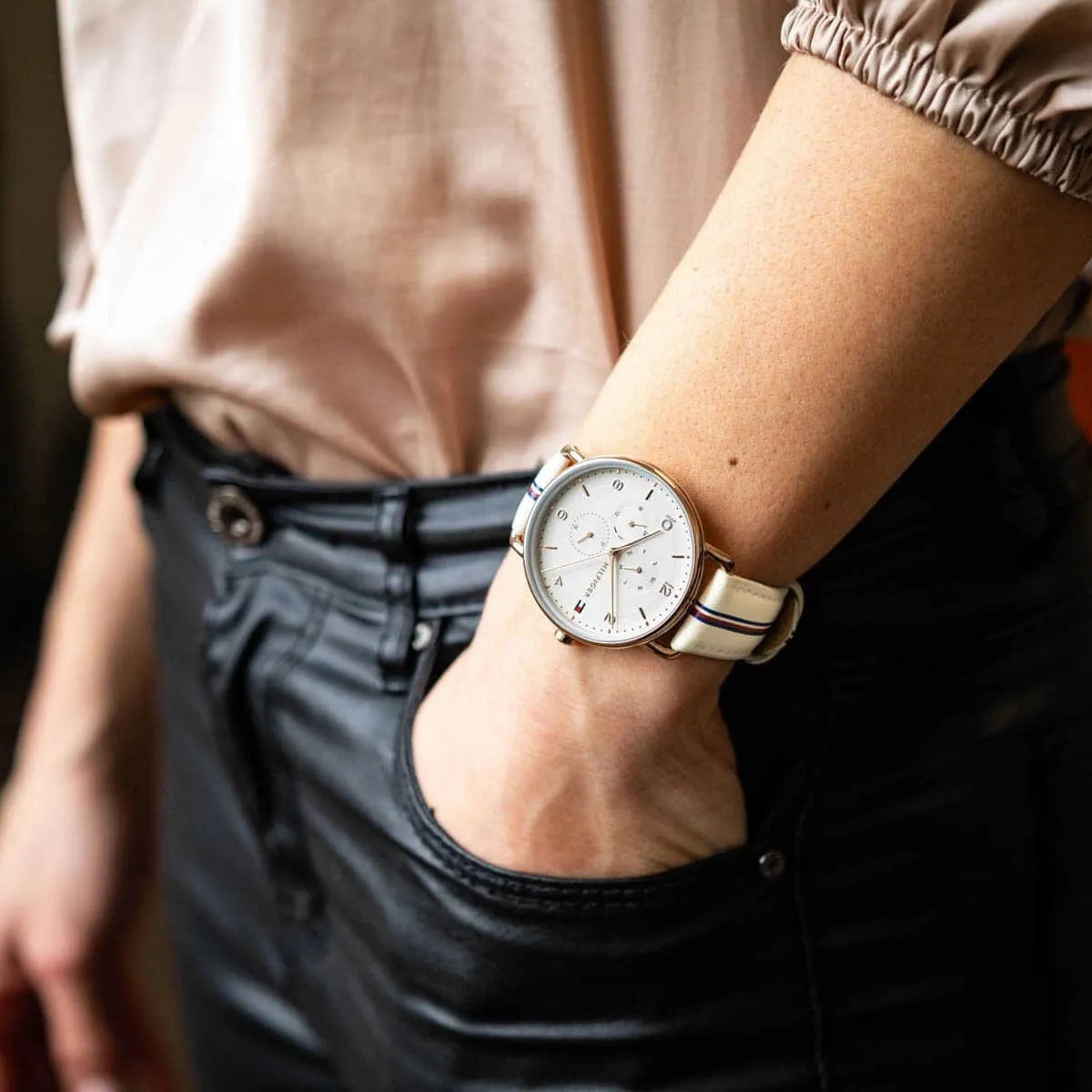 Tommy Hilfiger Lily watch worn on female wrist showing multi-function dial design