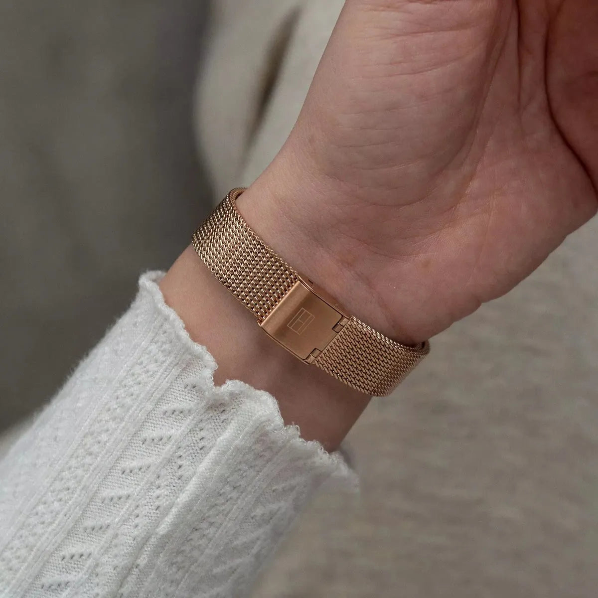 Tommy Hilfiger Pippa rose gold watch worn on wrist detail of mesh bracelet