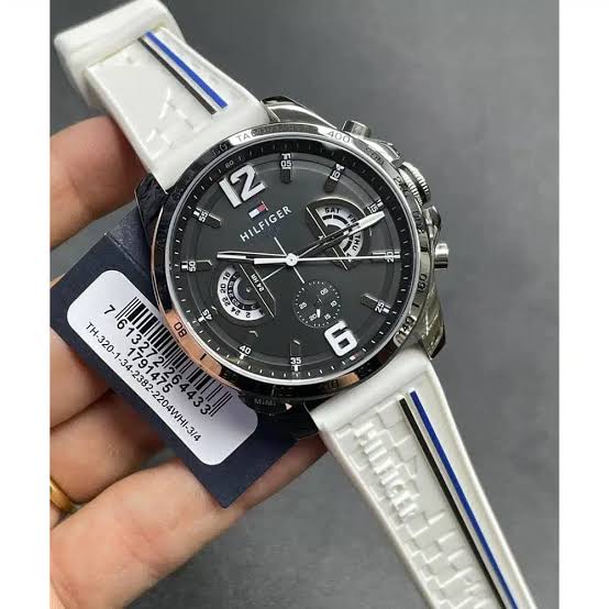 Tommy Hilfiger 1791475 watch with product tag showing white rubber strap detail