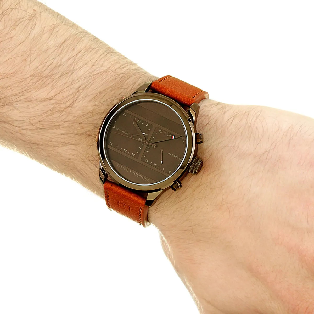 Tommy Hilfiger dual time watch on wrist with brown leather strap