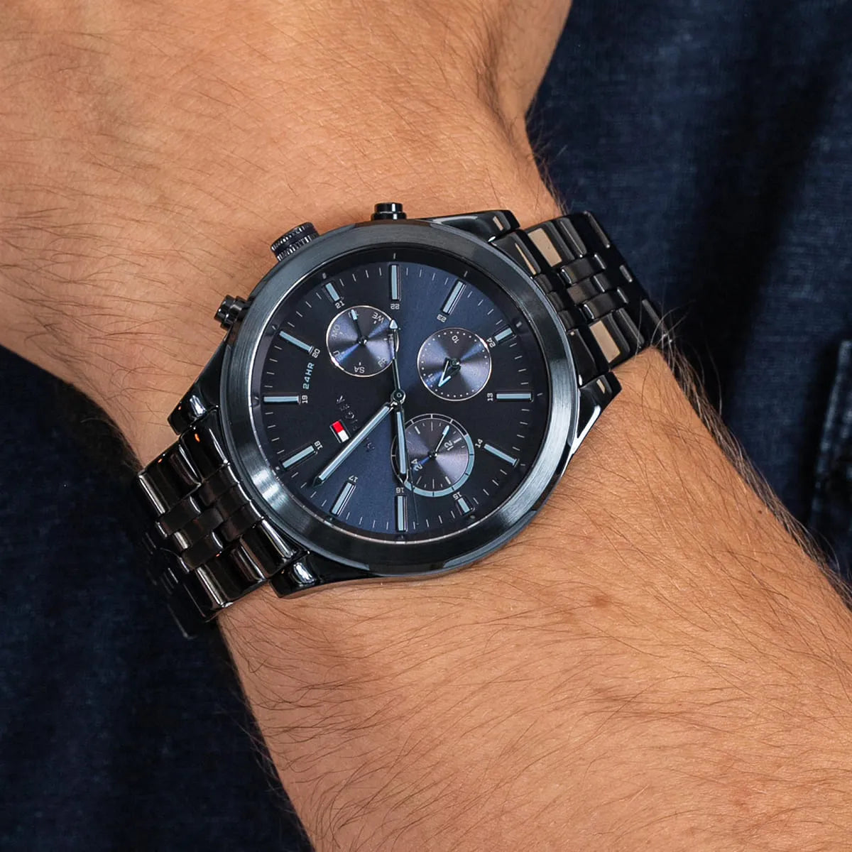 Tommy Hilfiger men's chronograph watch worn on wrist with stainless steel bracelet