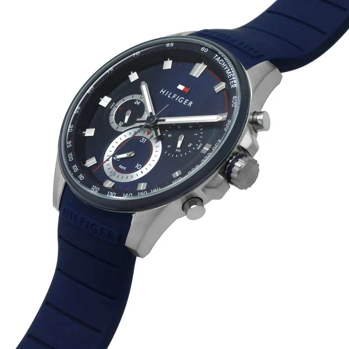 Side view of Tommy Hilfiger chronograph watch with blue rubber strap and pushers visible