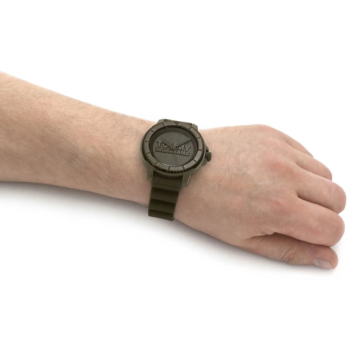Tommy Hilfiger Tokyo watch worn on wrist showing green dial and silicone strap