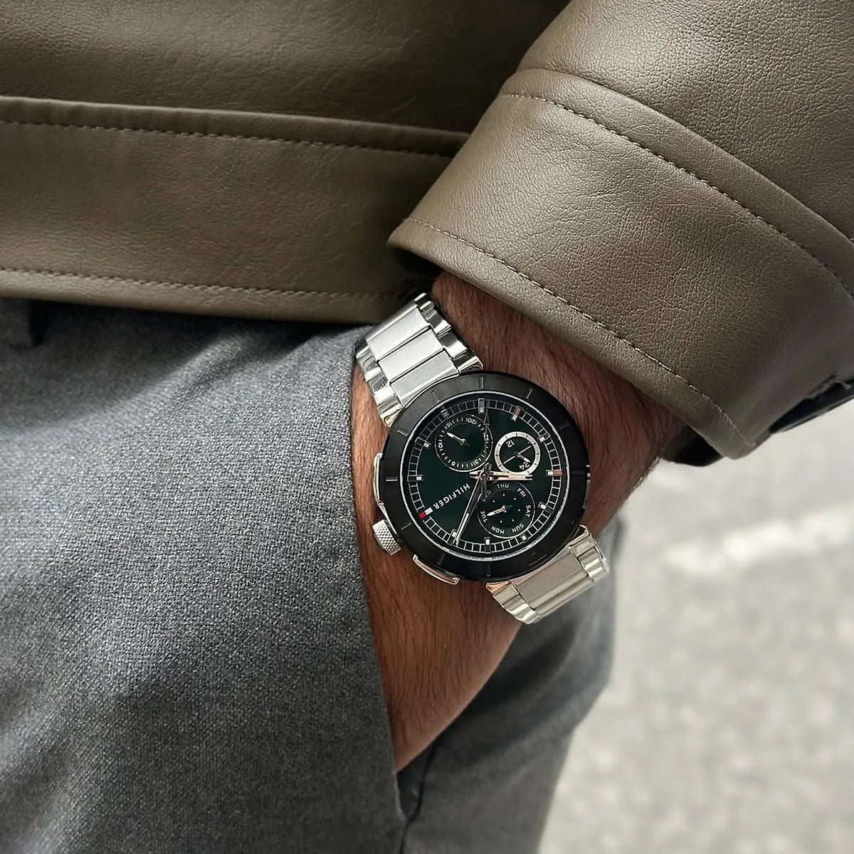 Wrist shot of Tommy Hilfiger Lorenzo watch with formal clothing