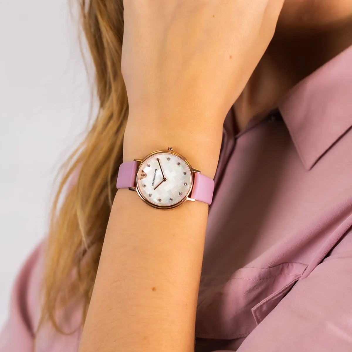 Emporio Armani AR11130 watch worn on wrist with mother-of-pearl dial visible