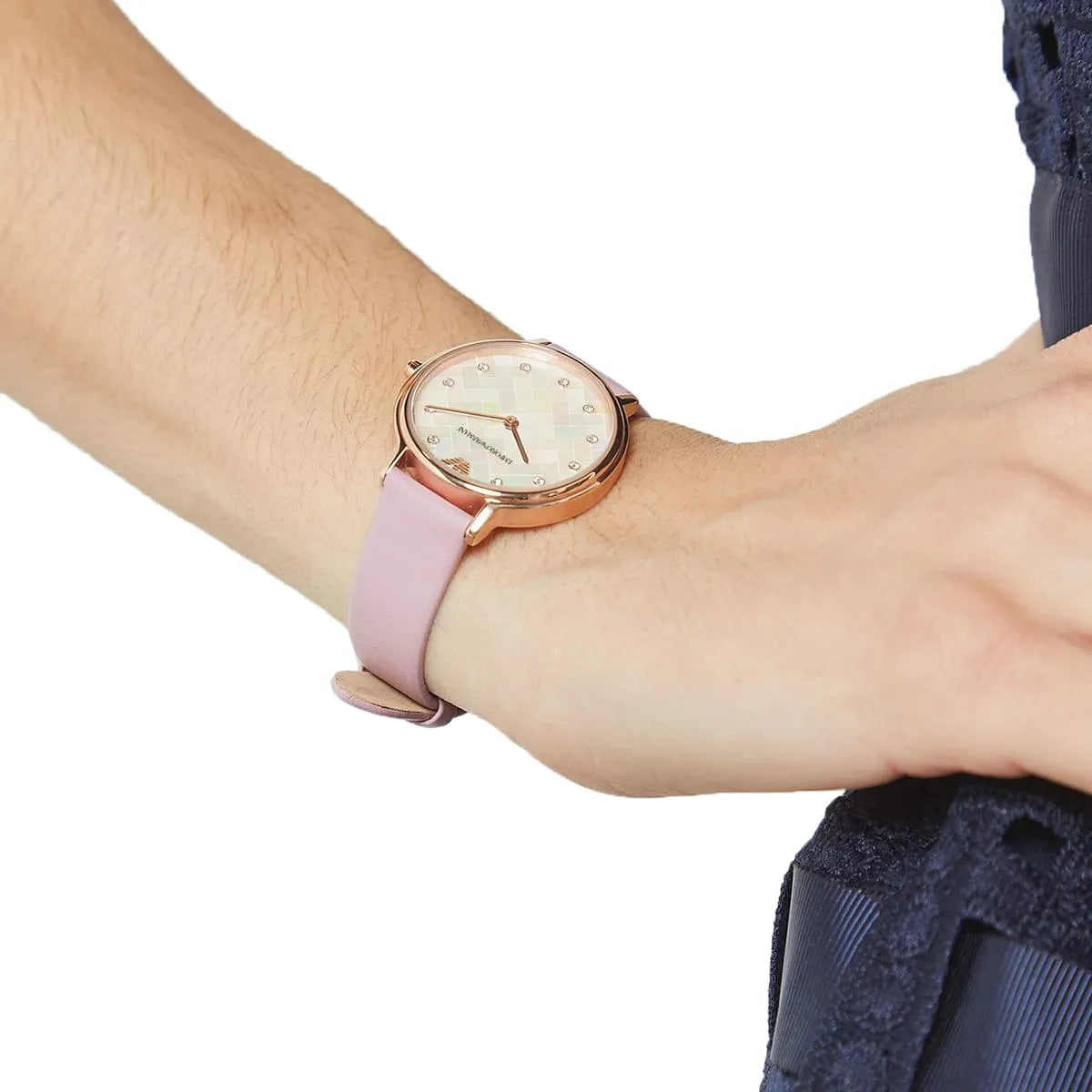 Emporio Armani AR11130 watch on wrist showing rose gold case and pink leather strap