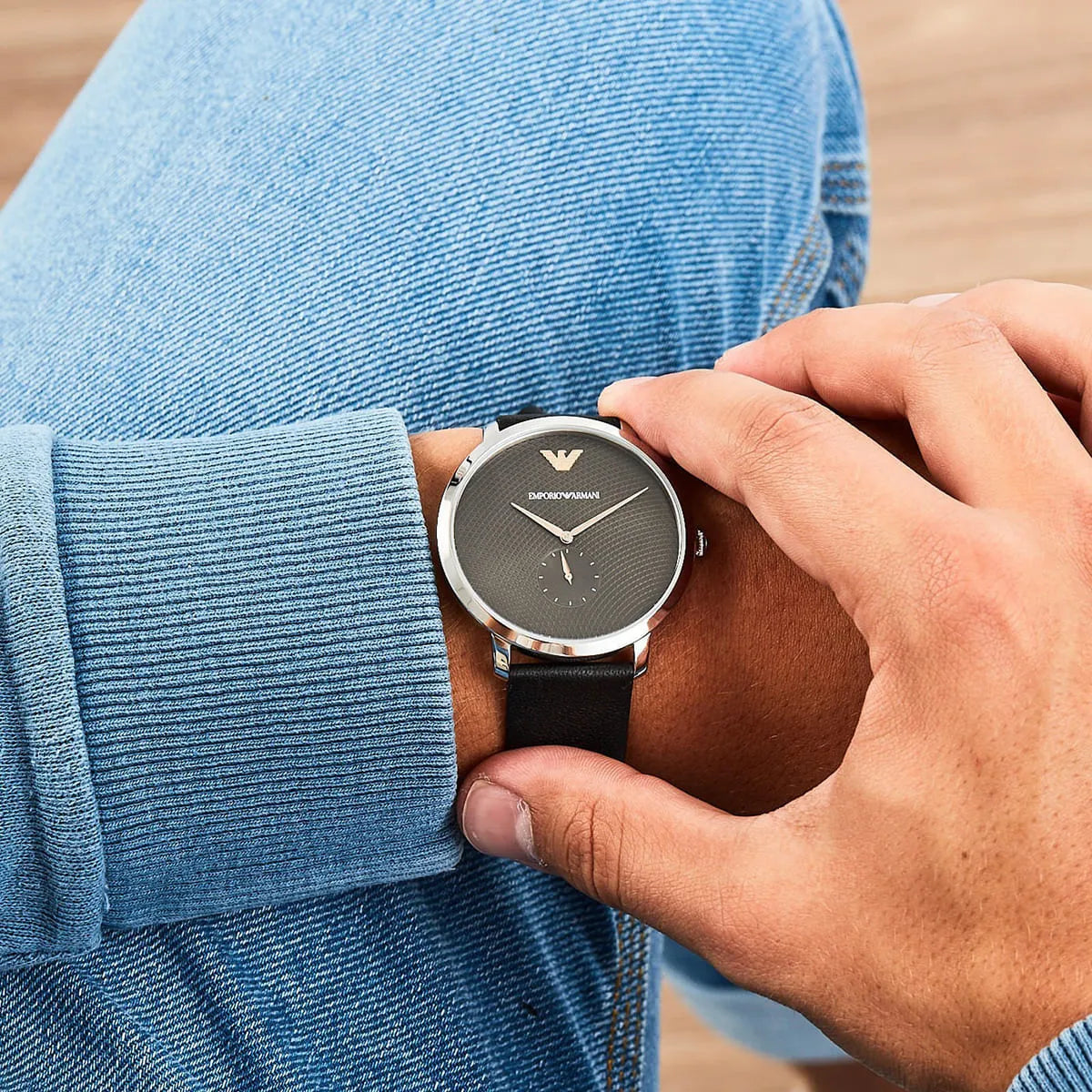 Emporio Armani AR11162 watch on wrist showing grey dial and proportions with black strap