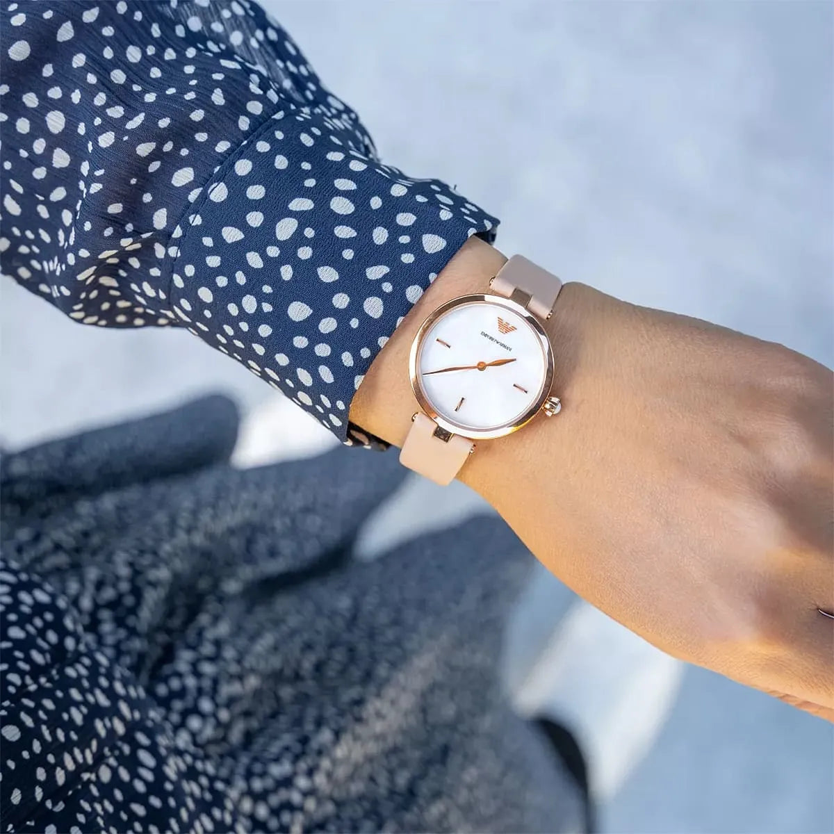 Emporio Armani Arianna watch worn on wrist with rose-gold case and white dial