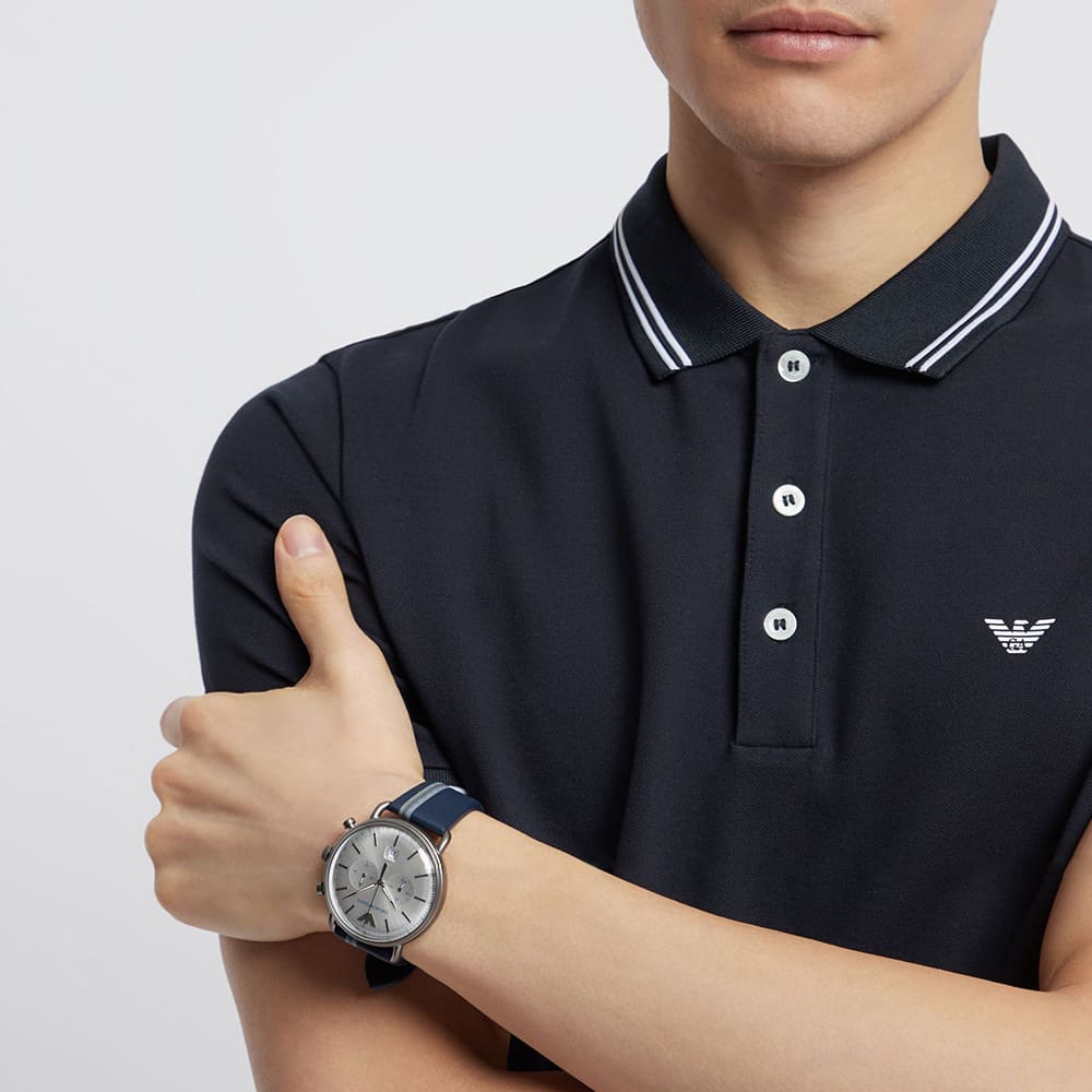 AR11202 Emporio Armani watch styled on wrist with navy polo shirt