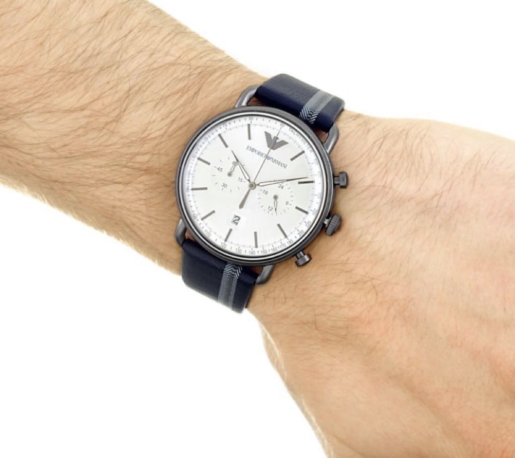 Emporio Armani AR11202 chronograph watch on male wrist with navy leather strap