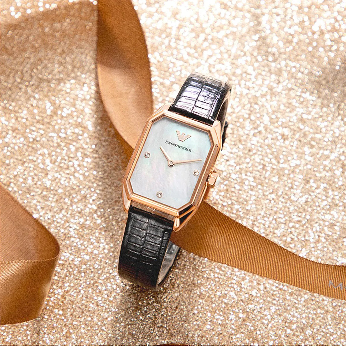 Emporio Armani Gioia AR11390 watch on wrist with mother of pearl dial, styled lifestyle shot