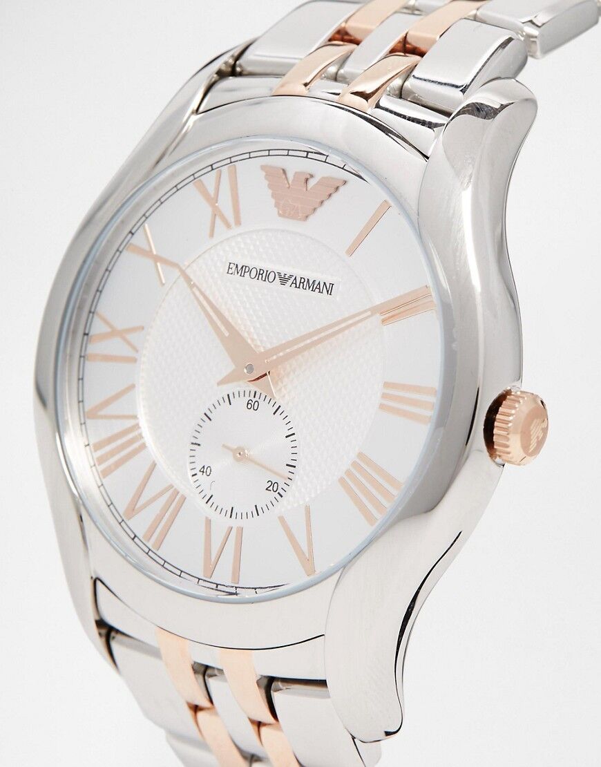 Angled view of Emporio Armani AR1824 showing two-tone bracelet and silver dial with Roman numerals