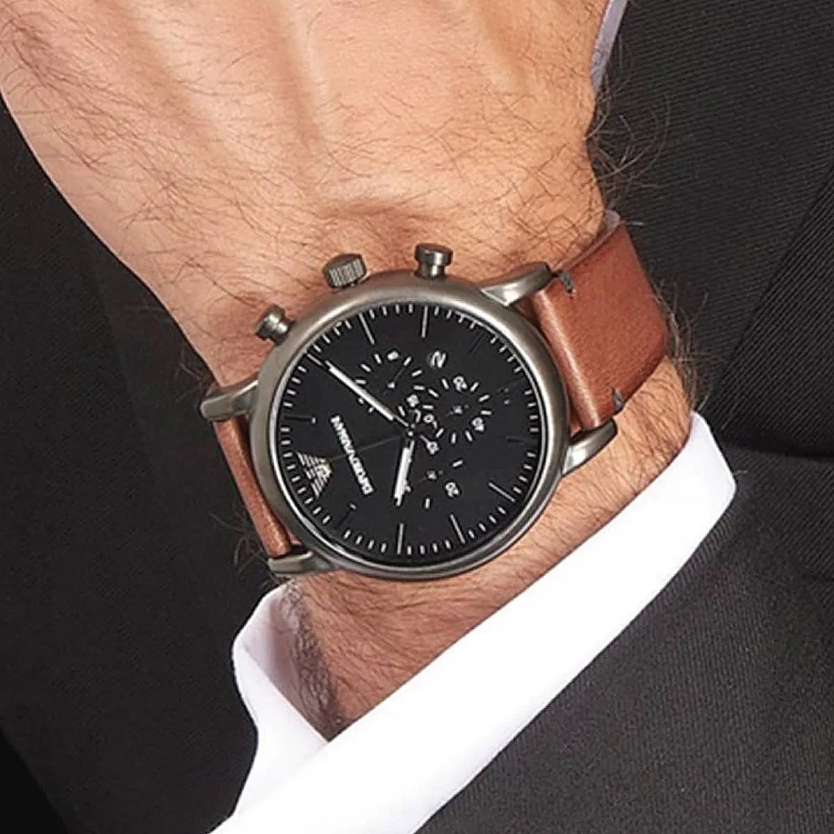 Emporio Armani AR1919 watch on wrist showing chronograph dial and brown strap