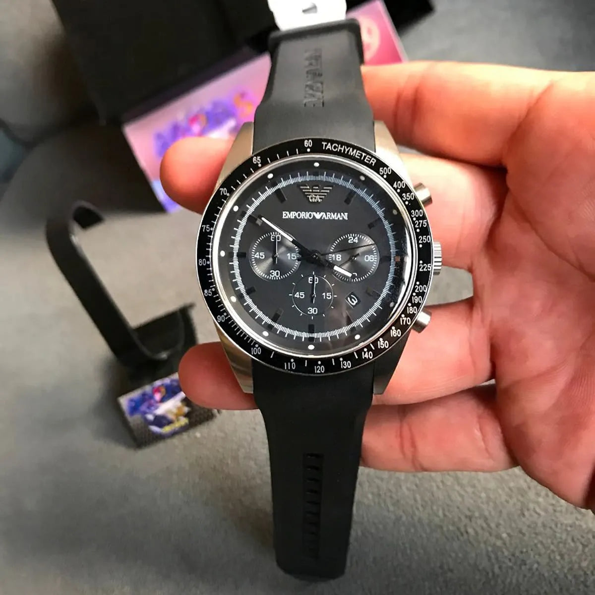 Emporio Armani AR5985 chronograph worn on wrist with black rubber strap