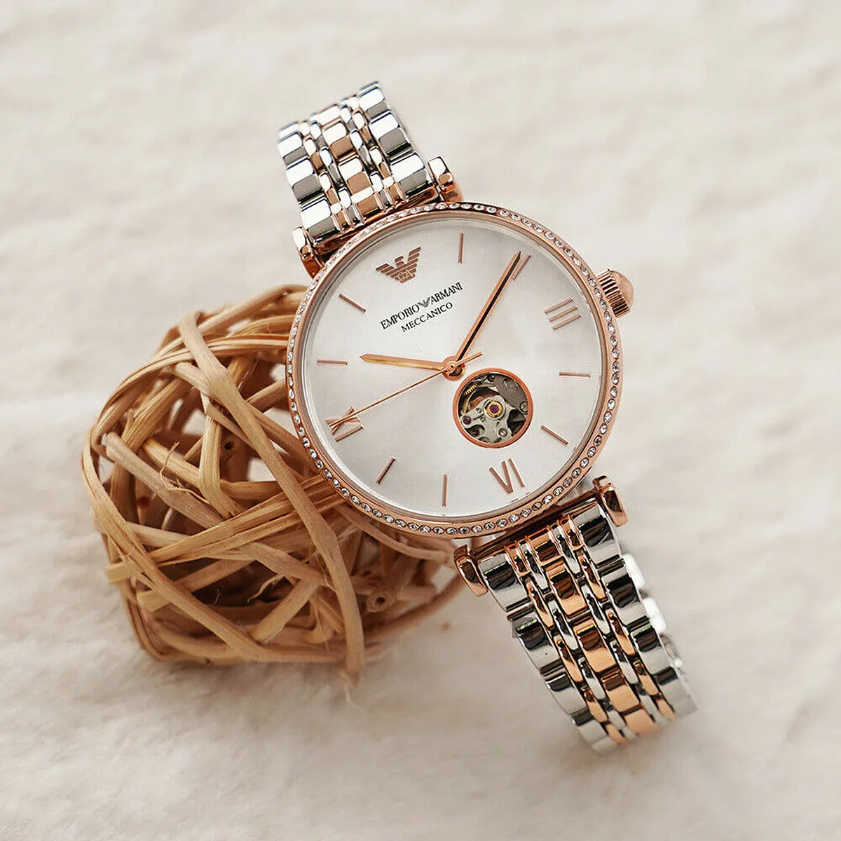 Emporio Armani Gianni women's watch styled on-wrist with two-tone bracelet