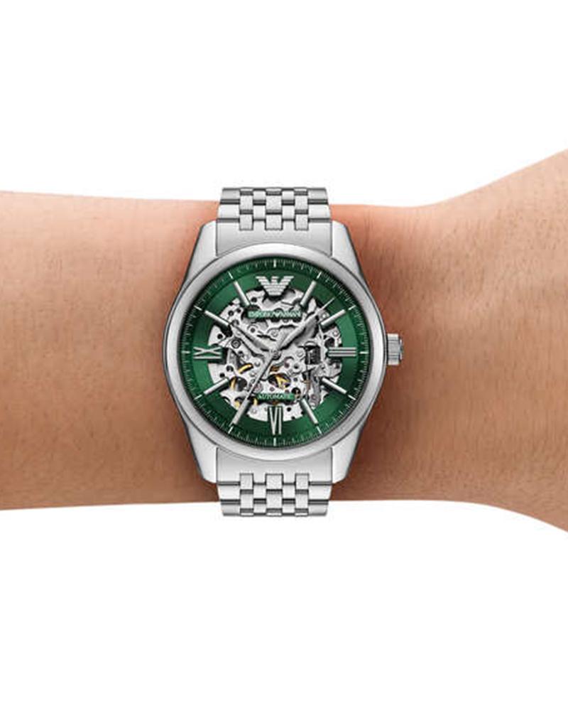 Emporio Armani AR60091 green skeleton watch worn on wrist