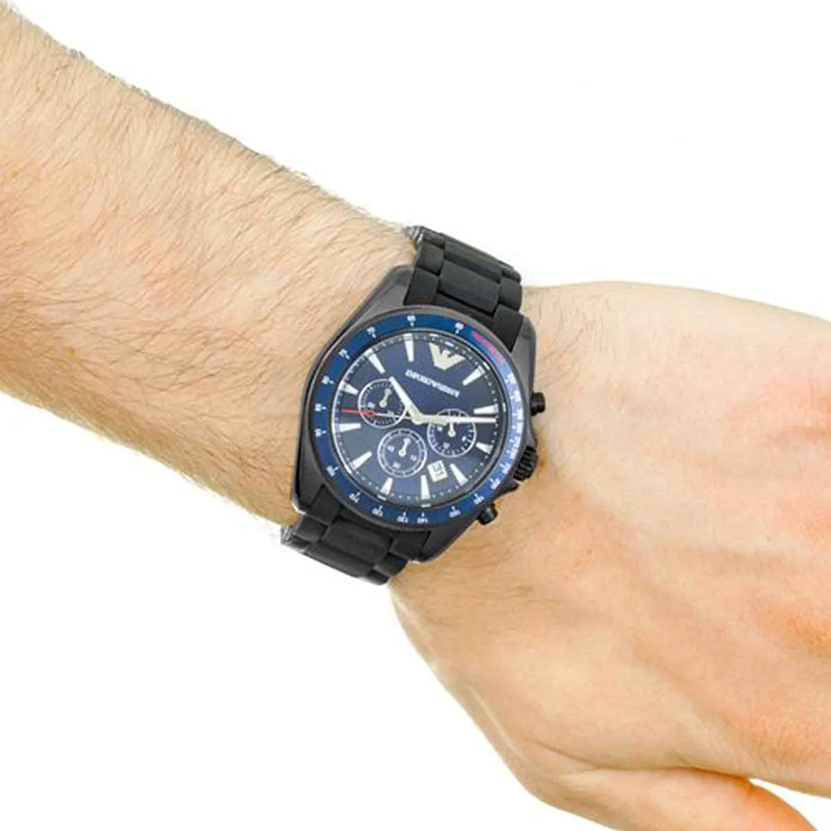 Emporio Armani Sigma chronograph worn on wrist showing blue dial and black strap