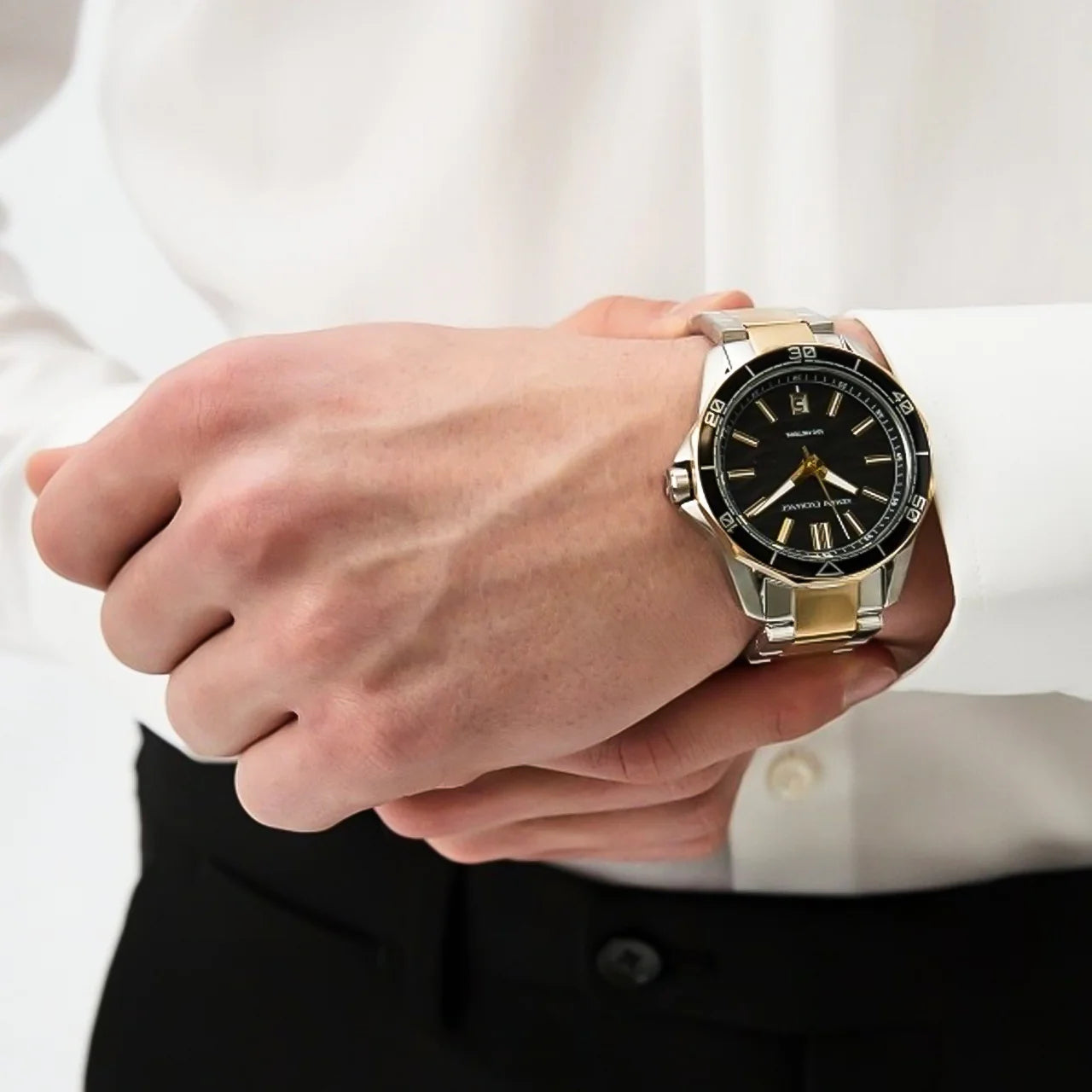 Armani Exchange AX1956 two-tone watch worn on male model's wrist