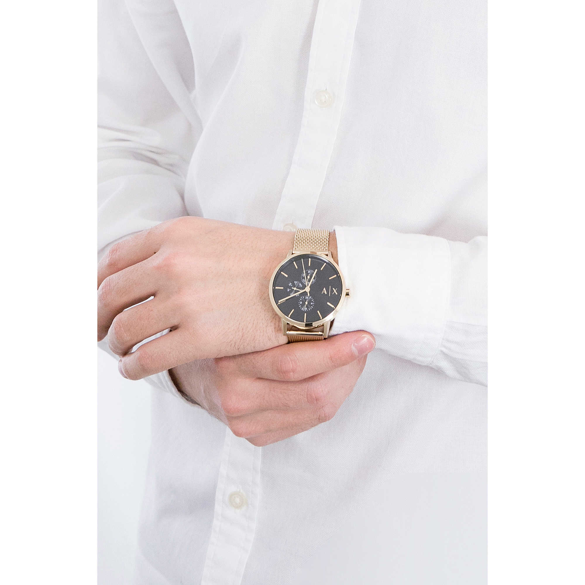 Armani Exchange Cayde gold mesh watch worn on wrist