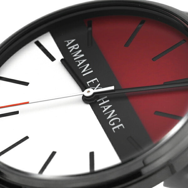 Close-up of Armani Exchange Cayde dial showing red and white sections with black hands and indices