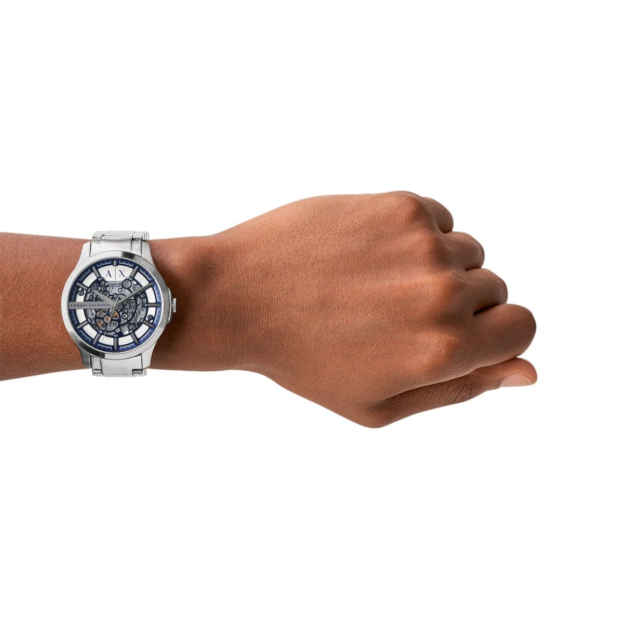 Armani Exchange Hampton automatic watch worn on wrist showing skeleton dial and bracelet