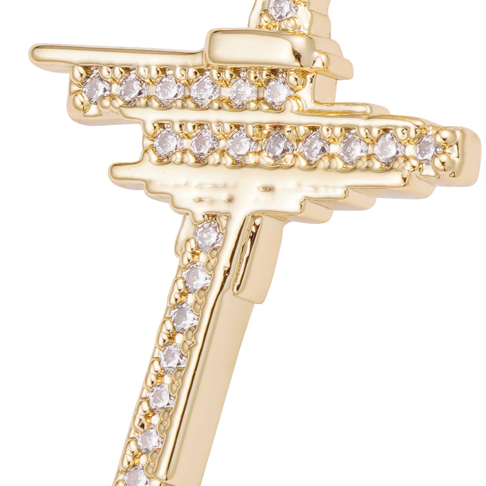 Close-up of iced out cubic zirconia cross pendant on hinged hoop