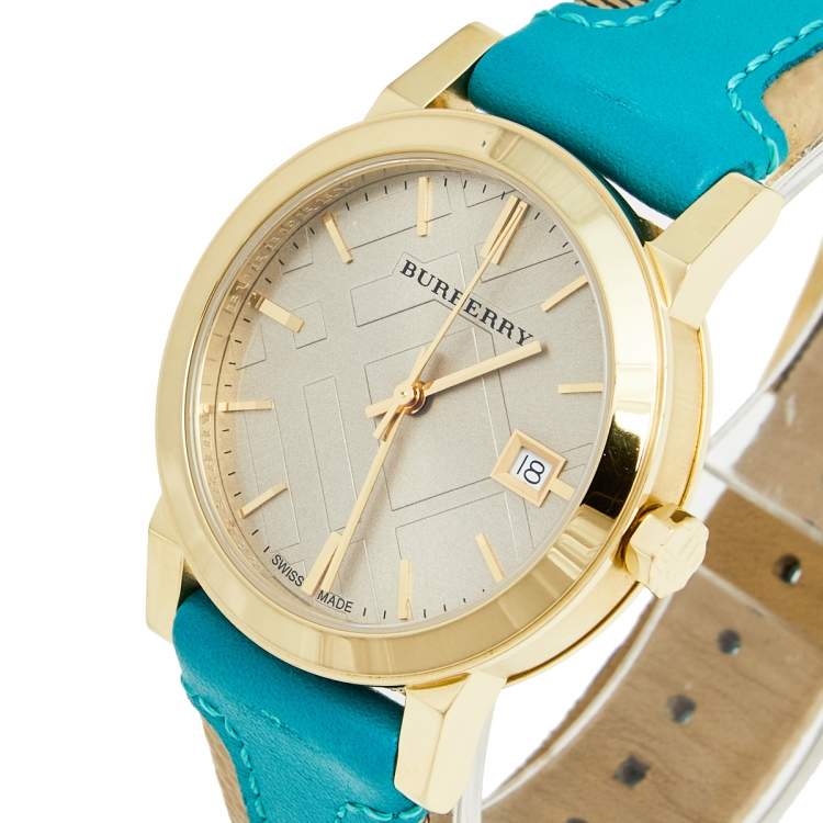 Burberry BU9018 dial detail showing nova check pattern and date window