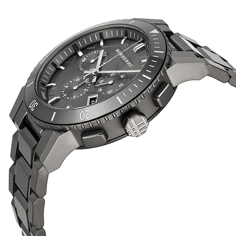 Side angle view of Burberry chronograph watch showing dial and grey ion-plated bracelet