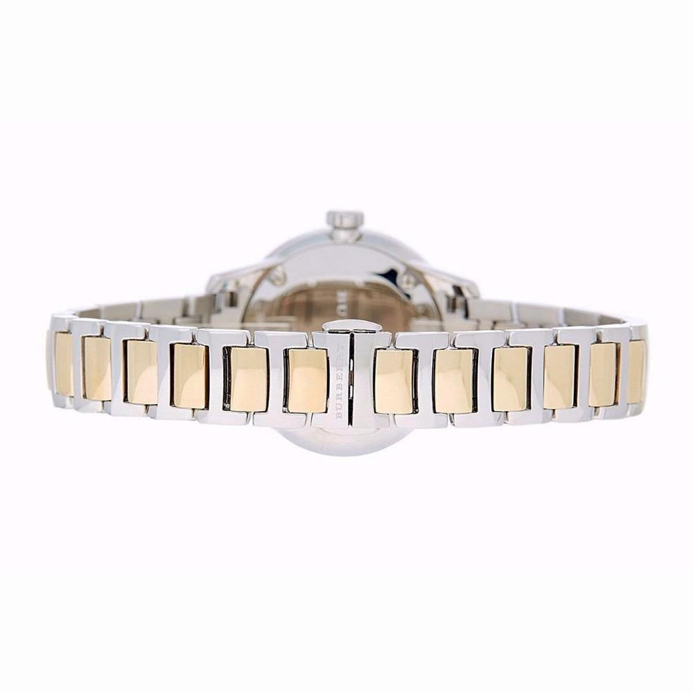 Caseback view of Burberry Classic women's watch showing two-tone bracelet design