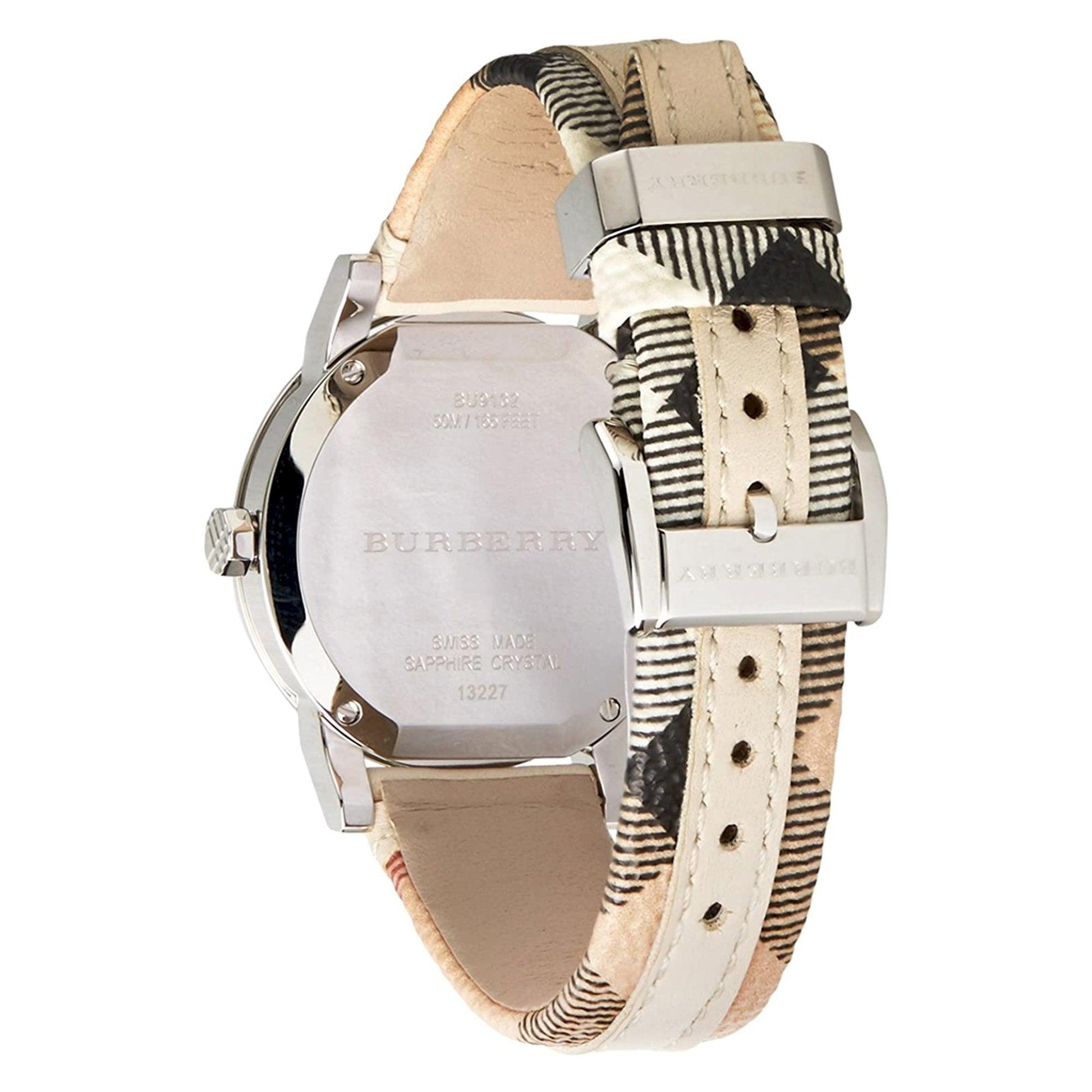 Burberry The City Haymarket watch caseback showing engraved branding and Haymarket patterned strap