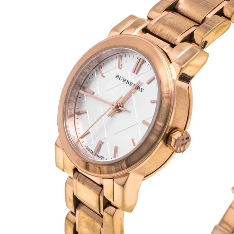 Burberry The City Petite rose gold watch worn, displaying white dial with rose gold indices