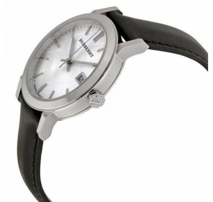 Burberry The City watch side view showing black leather strap and silver case