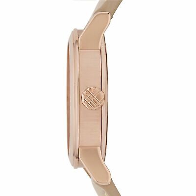 Side view of Burberry The City watch showing rose gold case profile and pink leather strap