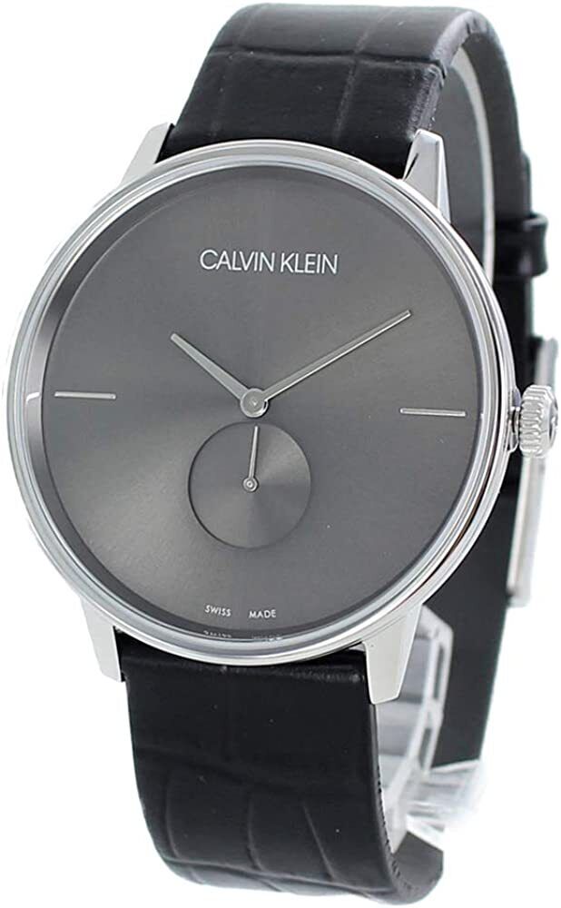 Calvin Klein Accent men's watch three-quarter view with black leather band and silver bezel