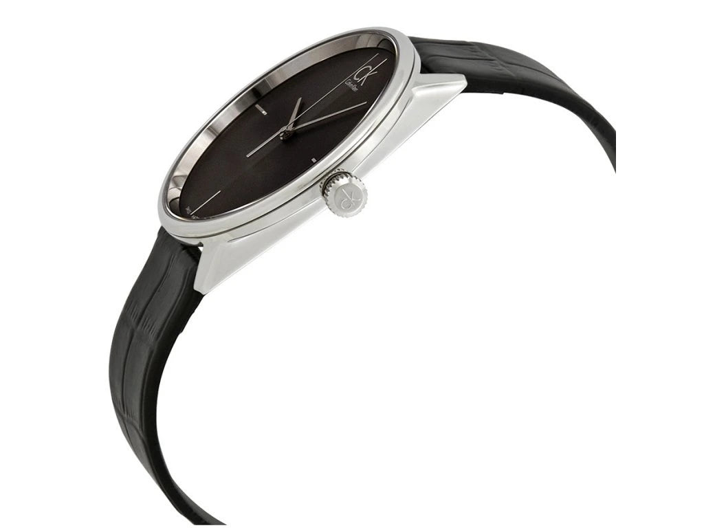Calvin Klein Accent watch worn on wrist showing black dial and minimalist design