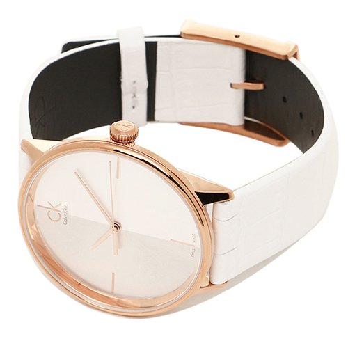 Calvin Klein Accent women's watch worn on wrist with white leather strap