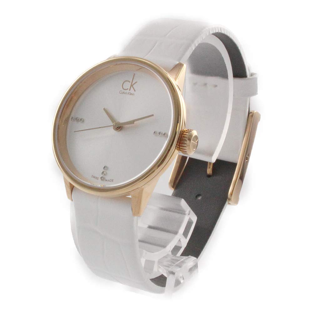 Calvin Klein Accent watch showing white dial, rose gold hands, and white strap detail