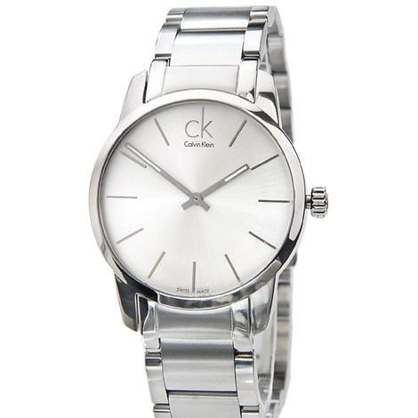 Side angle view of Calvin Klein City watch with round face and stainless steel band
