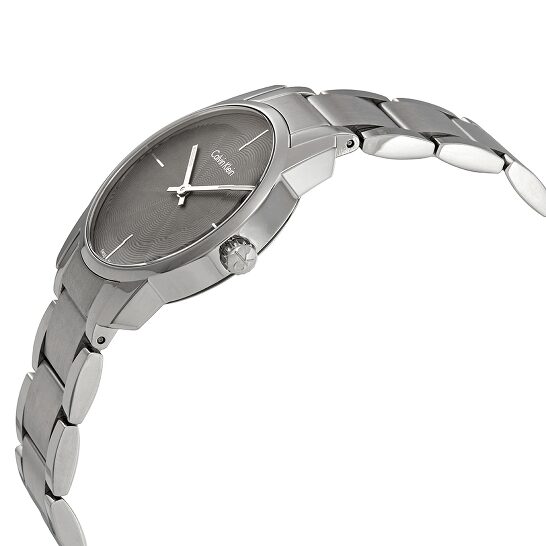 Angle view of Calvin Klein City watch showing case profile and stainless steel bracelet