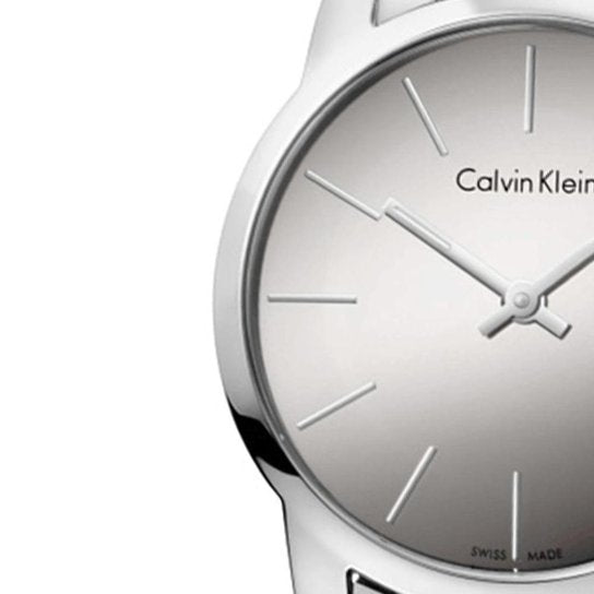 Close-up of Calvin Klein City watch dial with minimalist hour markers and hands